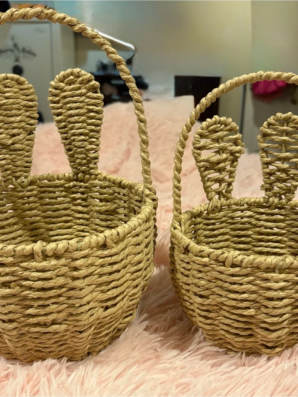 Homemade woven wicker and rattan bunny ear baskets.